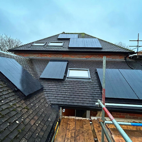 Solar PV Panels Across Roof of Building