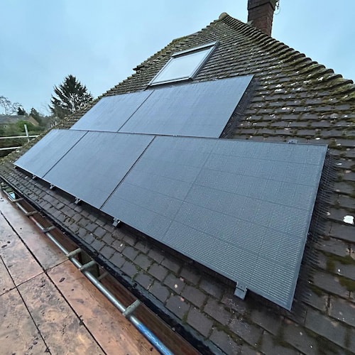 Solar Panels To Left Side Roof of Building